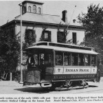 A Van Depoele system car of the early 1890's rolls past Atlanta's Southern Medical College on the Inman Park line of the Atlanta and Edgewood Street Railroad.