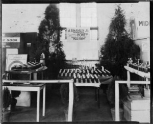 Photograph of the A.B. Hamlin Jr. Honey exhibit at the Georgia State Fair, Macon, Bibb County, Georgia, 1920-1939? Photograph held by the Middle Georgia Archives, Washington Memorial Library, Georgia State Fair Records, 1906-, box 12, folder 100b, photograph of A.B. Hamlin, Jr. Honey exhibit.