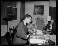 Julian Bond, politician, at press conference with reporter Eleanor Shano. Documenting Our Past: The Teenie Harris Archive Project. Carnegie Museum of Art.