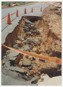 Photograph of Street Washout at Hunter's Ridge, Byron, Peach County, Georgia, 1994 July 7. Peach County Flood Photographs, Peach Public Library.