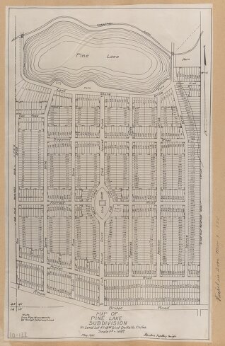 Page from DeKalb County plat map book pasted into binder. Map illustrations are black ink on white background.